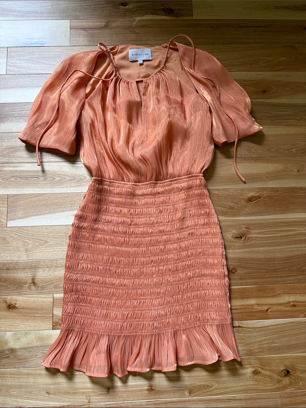 Adelyn Rae Peach-Orange Smocked Mini Dress with Ruffle Hem